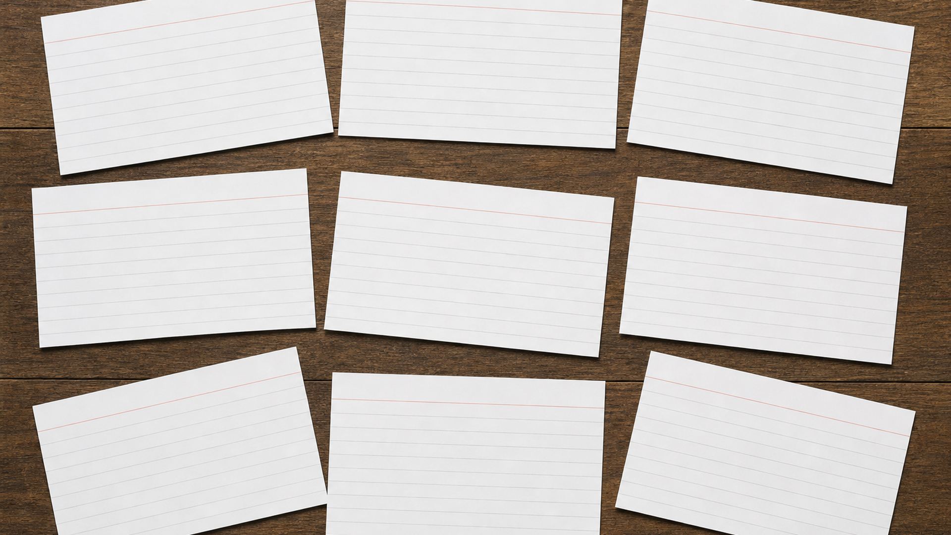 Content strategist grouping index cards on a table